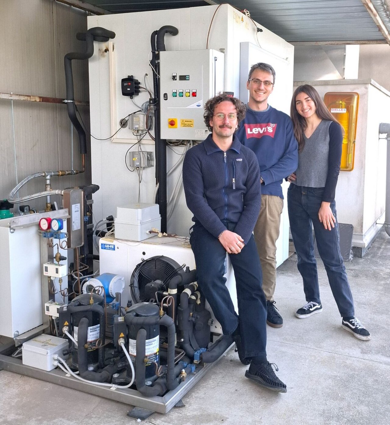 Left to right: Igor Carraretto, William Ferretto and Chiara D’Ignazi, researchers at DENG, with the “smart” cold room designed for the I-FERME Project