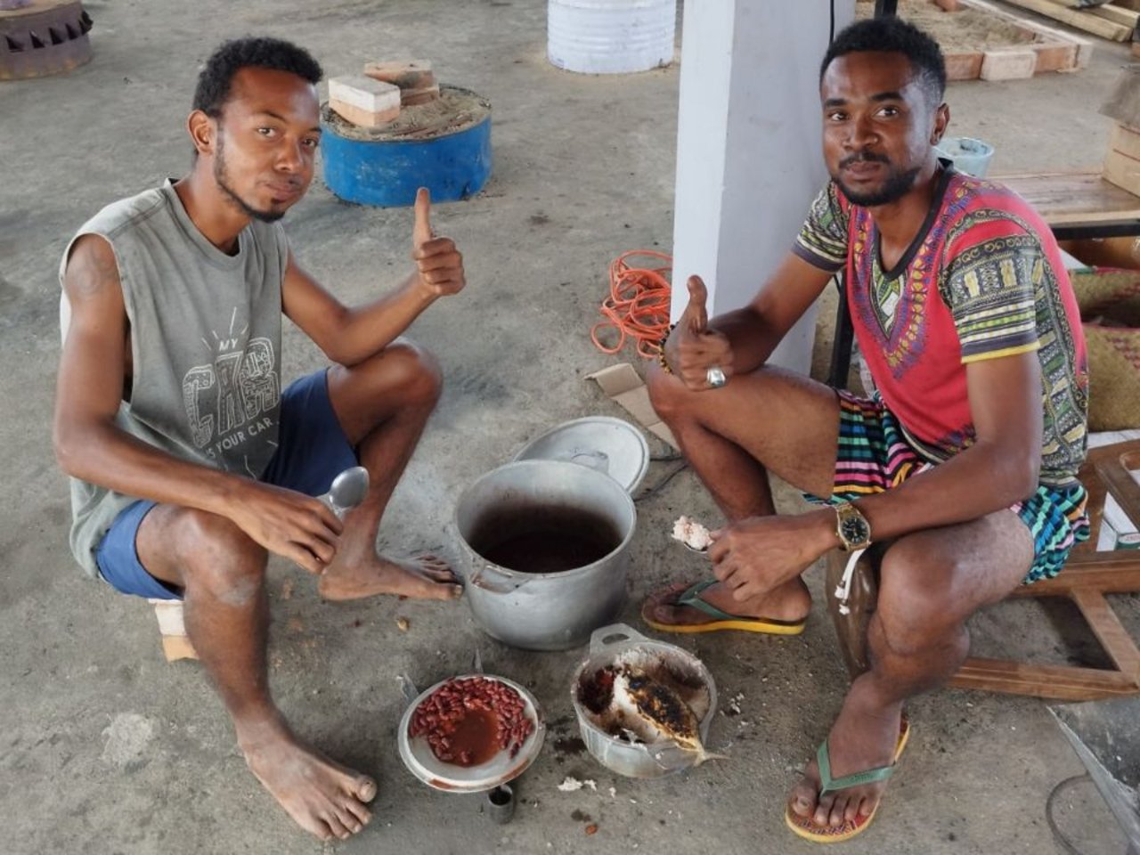 The first lunch cooked on briquettes by Kenyo and Aristide, local members of the team