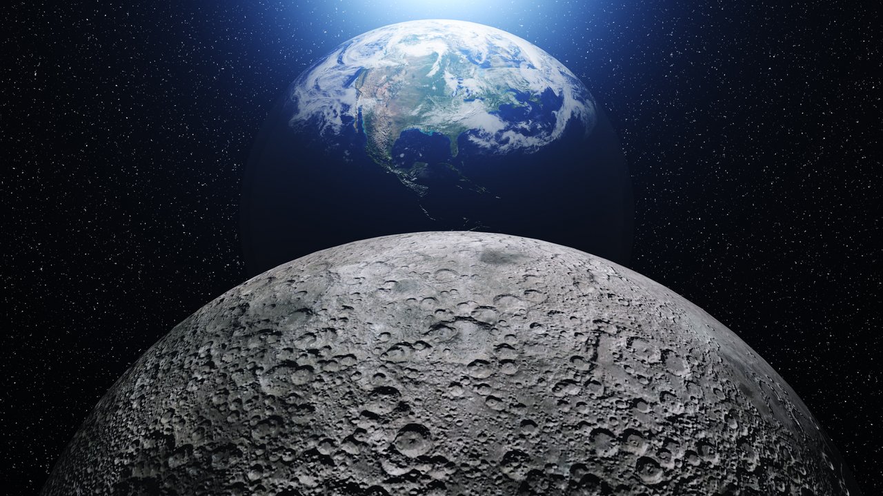 Earth viewed from space above the Moon’s horizon with a cratered lunar surface in the foreground