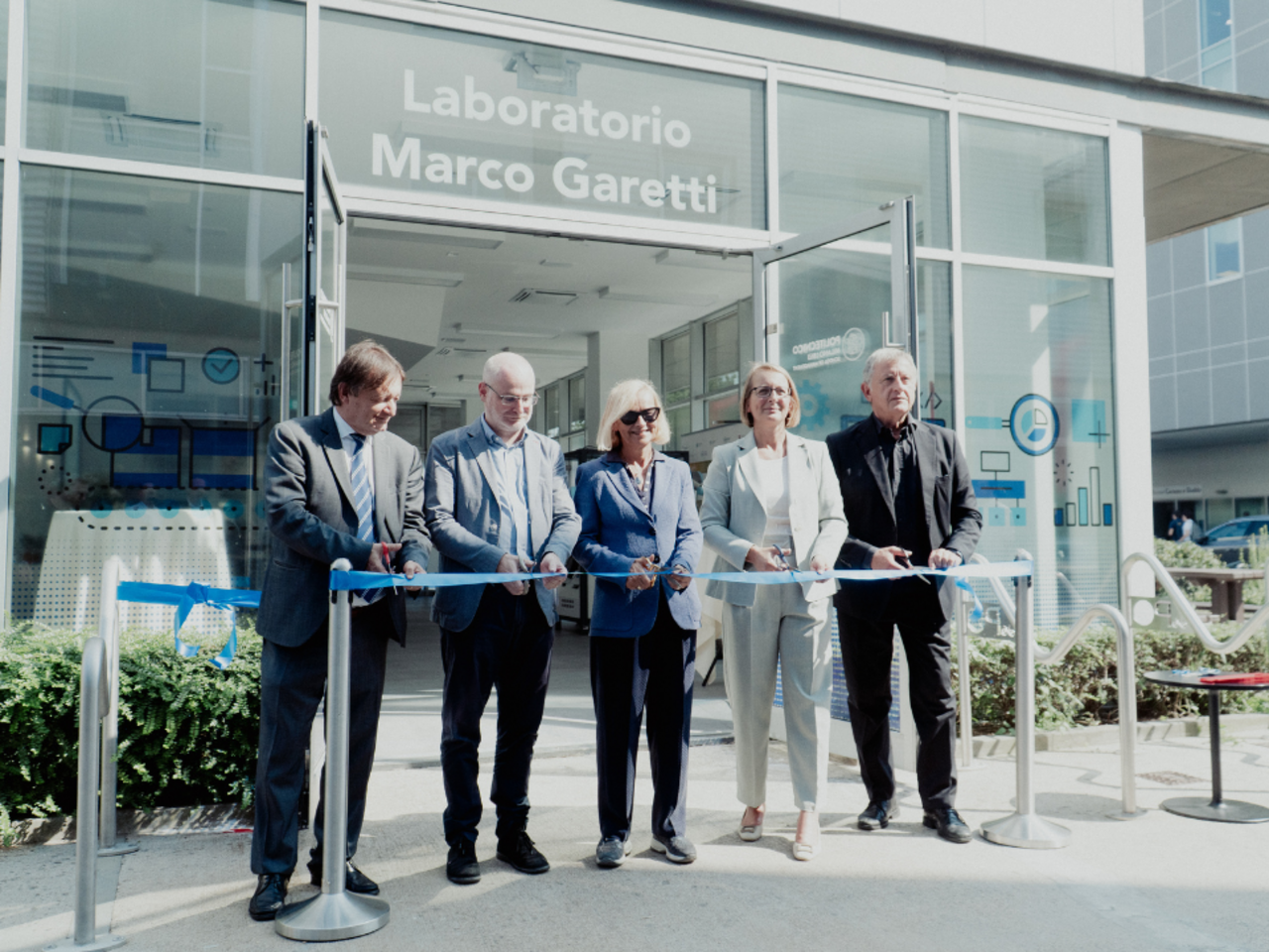  Ribbon cutting with the Rector in front of the laboratory