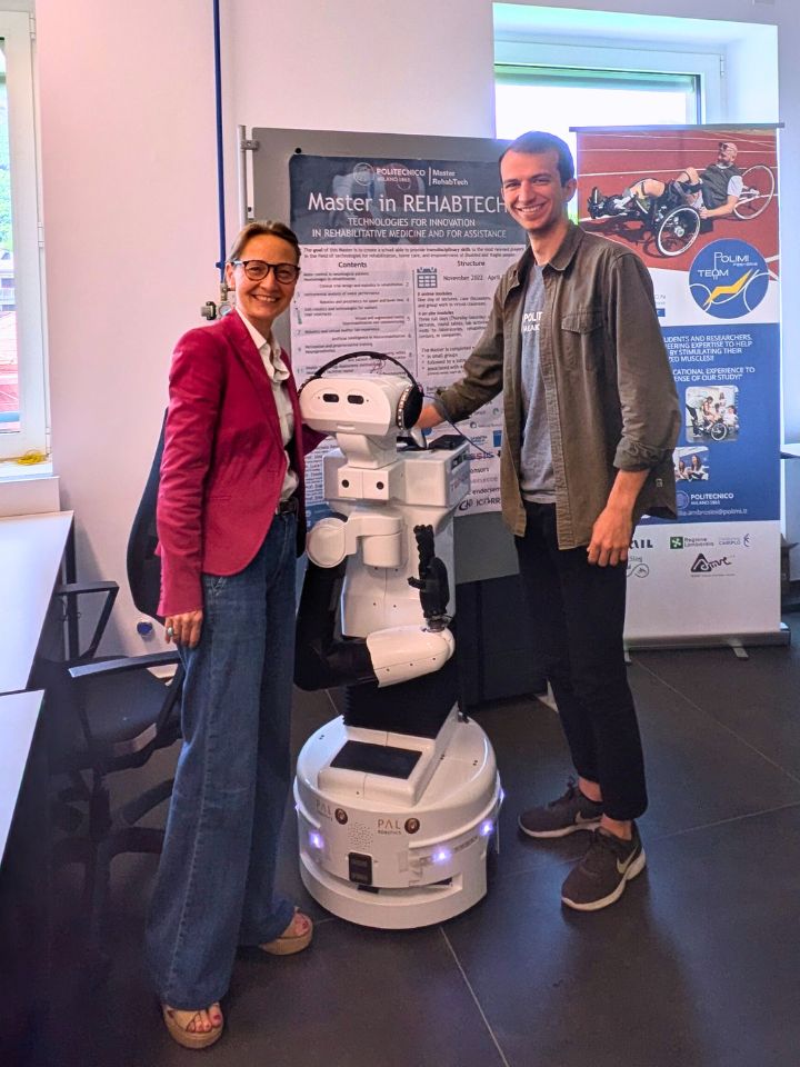 Alessandra Pedrocchi with TIAGo and Luca Pozzi, PhD candidate in Mechanical Engineering